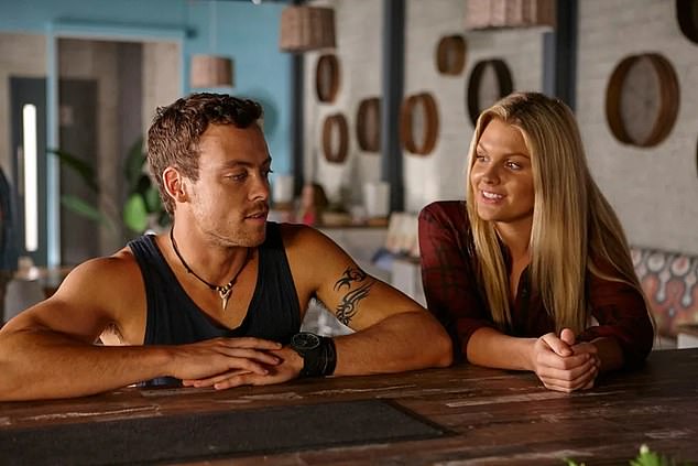 Sophie and her boyfriend Patrick play Dean Thompson and Ziggy Astoni on screen and also enjoy an off screen romance Pictured: The couple sharing a scene in Home and Away