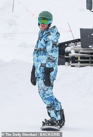 Bieber doesn't have a bunny hill: Justin showed off his skills as a snowboarder, enjoying multiple runs down the mountain.