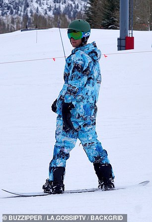 Bieber doesn't have a bunny hill: Justin showed off his skills as a snowboarder, enjoying multiple runs down the mountain.