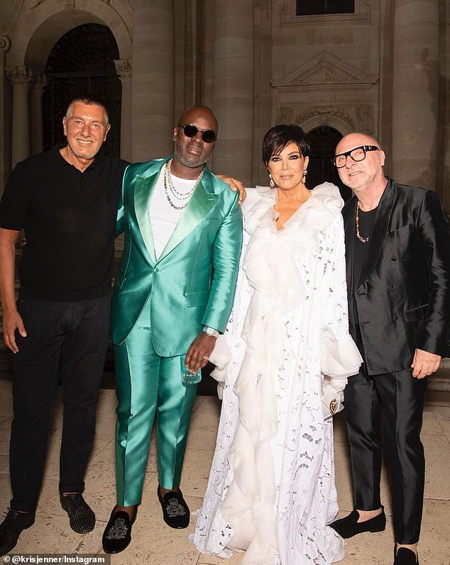 Kris and her man: Jenner's longtime partner Corey Gamble appeared in the fourth photo wearing a velvet green suit with a white T-shirt.