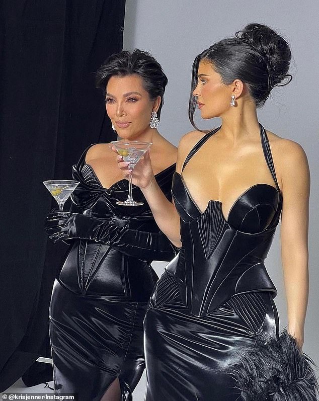 Tight clothing: She showed off her body in a leather dress similar to Kylie's in the final snap.