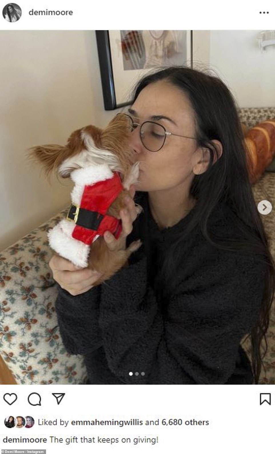 Cute!  Demi Moore looked like the doting dog mom in her latest Instagram post as she planted a sweet kiss on her adorable chihuahua, Pilaf.