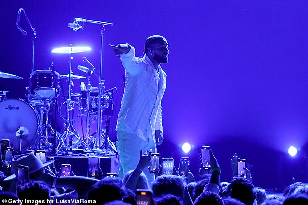 Hitting the stage: Drake seen performing on Thursday night in St Barts