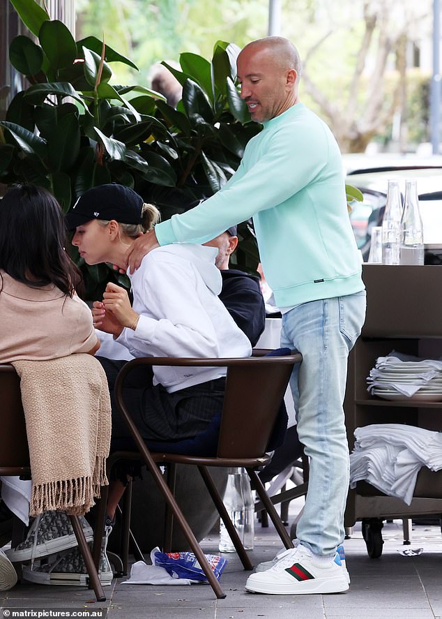 The couple filled out the PDA, with Jason hugging Marie-Lou as she sat in her chair.