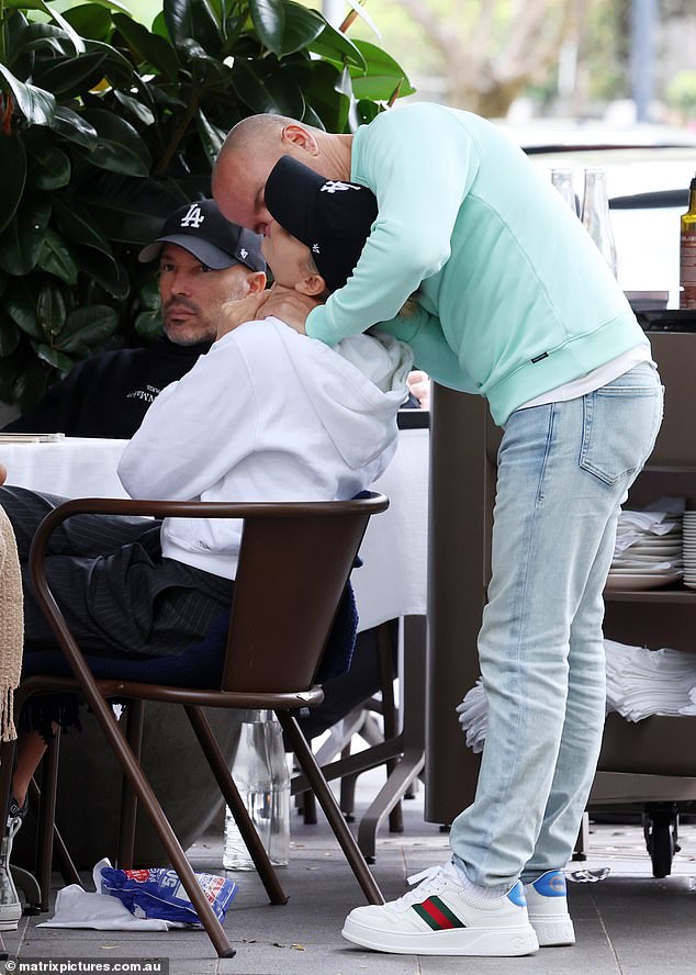 The couple were extremely affectionate in the restaurant.