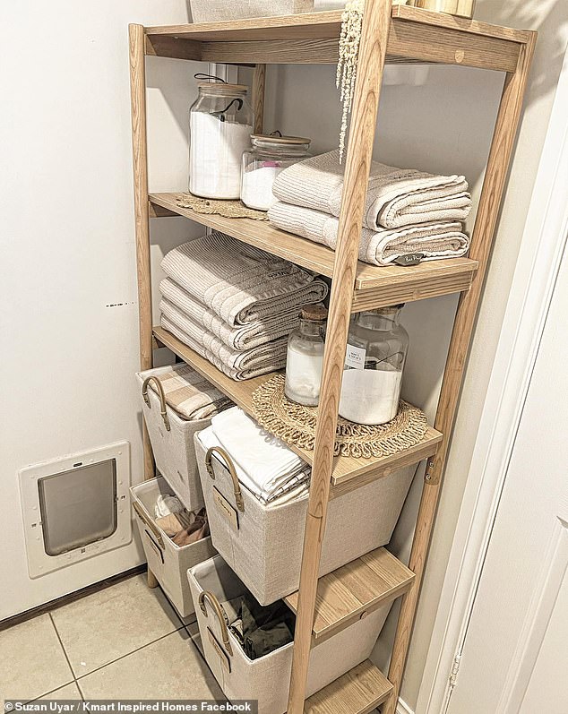 Even the laundry storage for laundry was stylish with matching towels and baskets, as well as jars to store laundry detergent and powder, all on a shelf from Target.