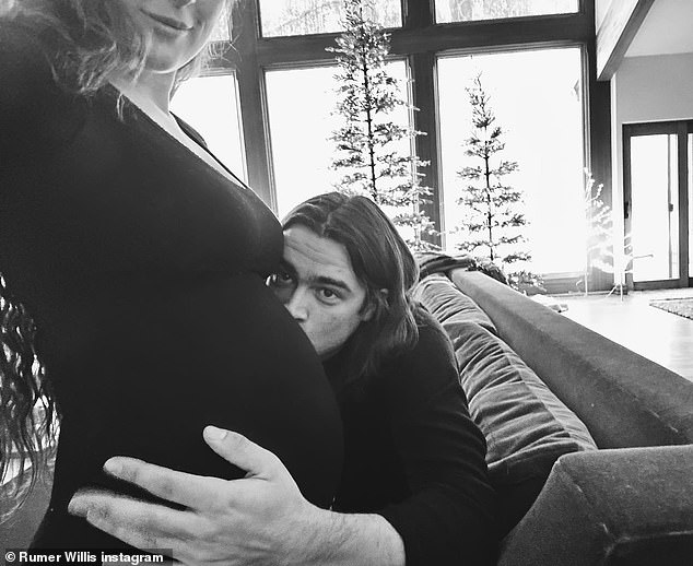 Overjoyed: Willis and boyfriend Derek Richard Thomas went public with their pregnancy in an Instagram post on December 20