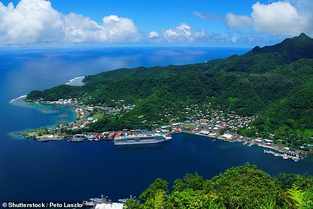 Stranded passengers spent Friday on a tour of Pago Pago Island (pictured) and enjoyed beers on a deserted beach