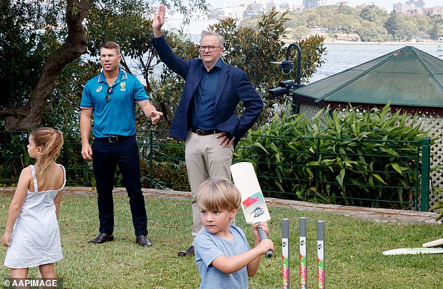 The politician got athletic on the field with David's daughters Ivy, seven, Indi, six, and Isla, three, whom he shares with his wife of seven years, Candice.