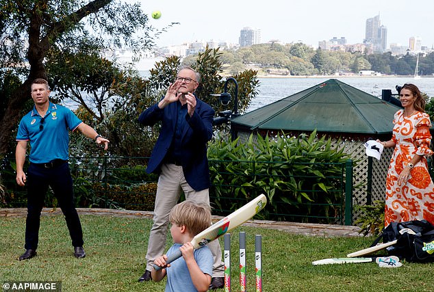 The group headed out onto the lawn to play a game of cricket.