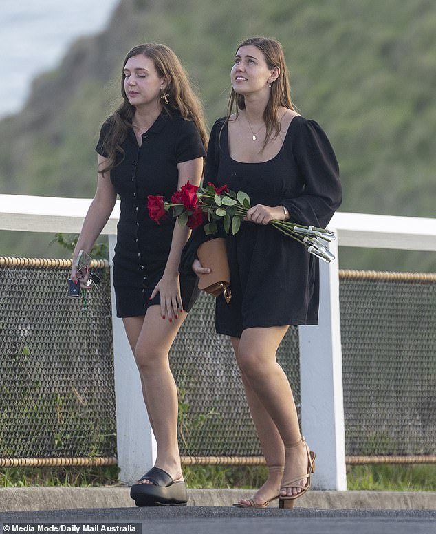 Miss Higgins wore a black scoop-neck dress for the occasion, paired with elegant sand-colored simple heels and a matching clutch (pictured).