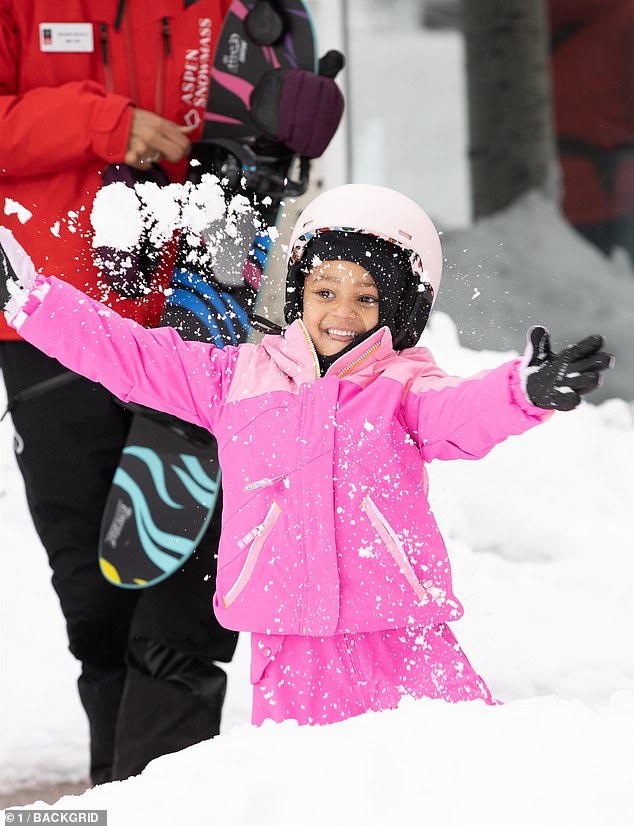 In awe: it looked like Stormi had a great time playing in the snow before the new year.