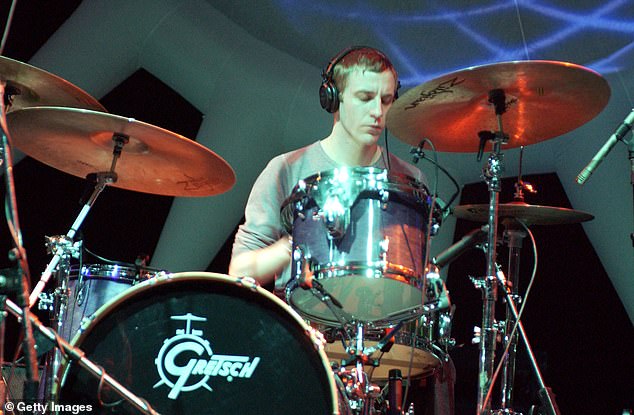 An Artist: Green was hailed among indie rock critics for his percussive style.  He was with the band his entire life, except for a brief period from 2003 to 2004;  seen in 2004 in San Francisco