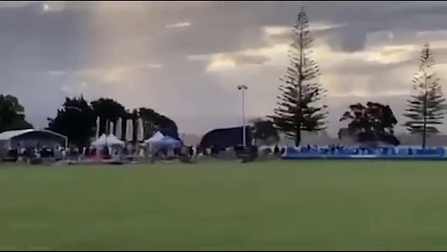 The jumping castle at the Matua New Year's Eve community celebration in Tauranga is shown (centre) tumbling across the ground