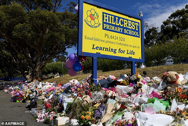 Flowers are displayed at Hillcrest Primary School in Tasmania after six children were killed in a bouncy castle incident on December 15, 2022.