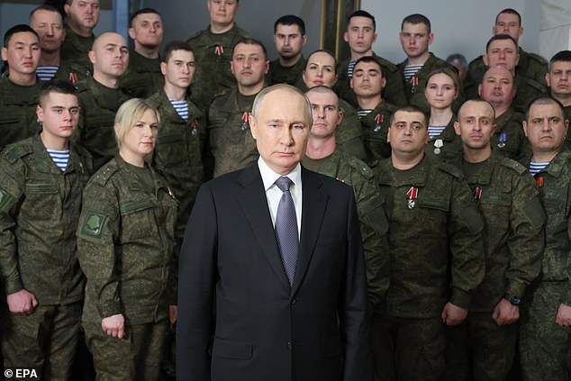 Russian President Vladimir Putin delivers his New Year address to the Russians during his visit to the Southern Military District headquarters in Rostov-on-Don, Russia, December 31, 2022.