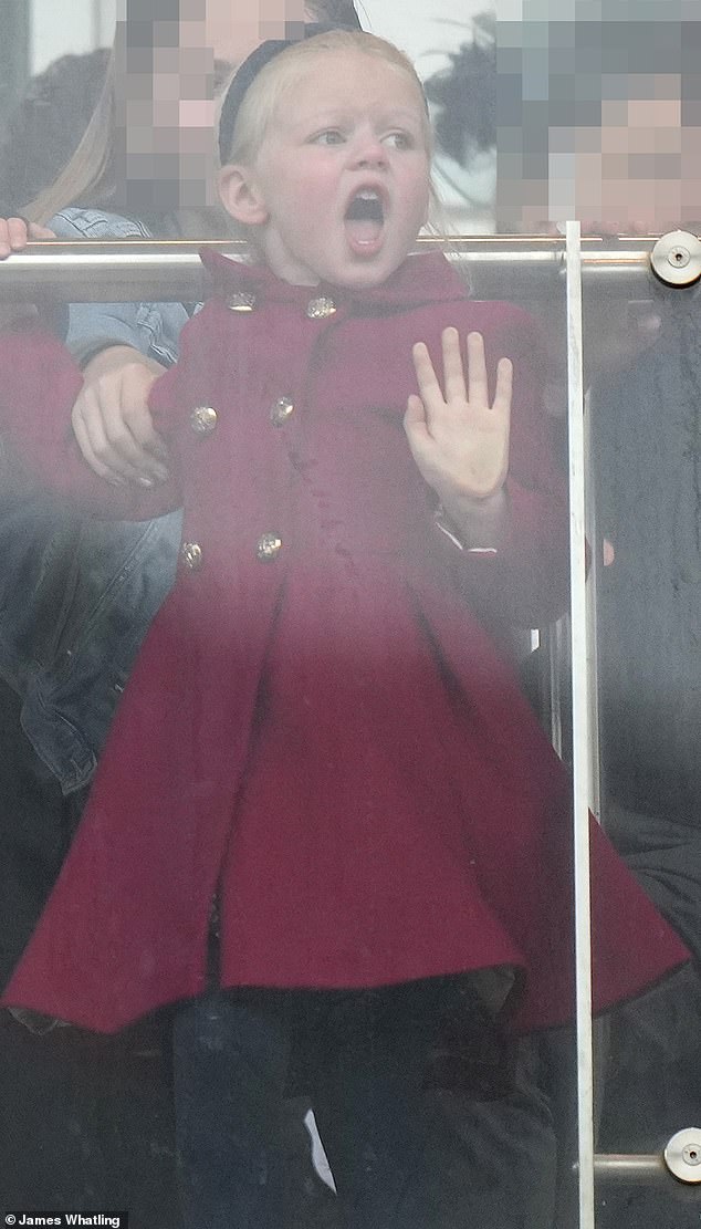 Four-year-old Lena looked as lively as her older sister Mia when she was at Cheltenham Racecourse.