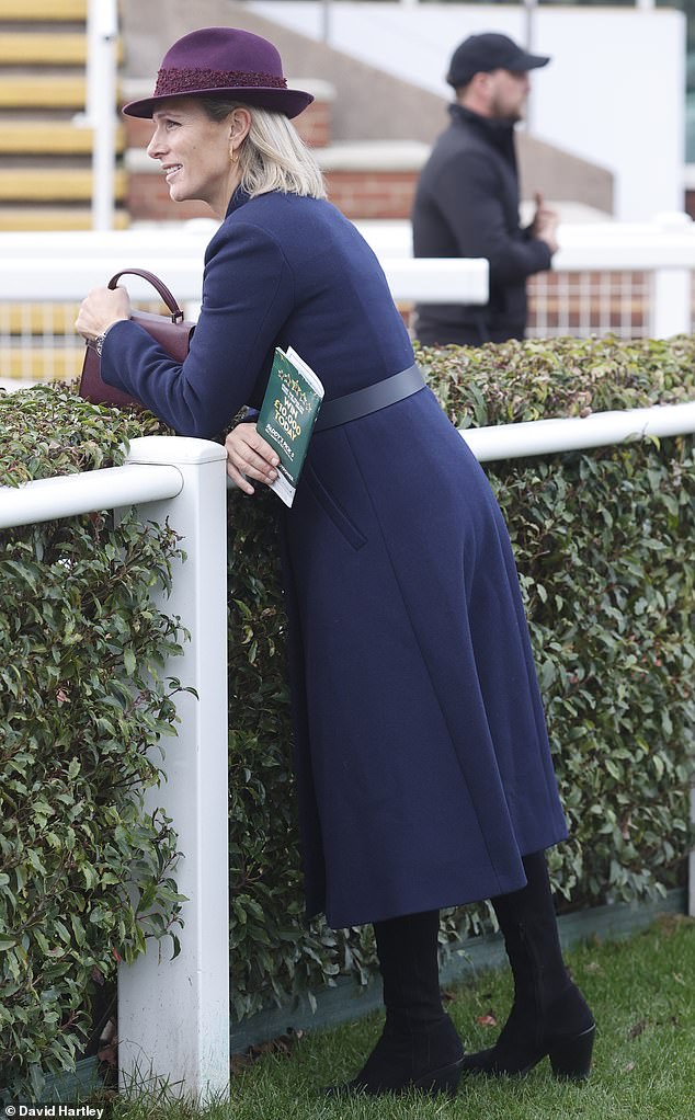 Zara donned chunky heeled black boots, sporting a minimal makeup look as she styled her blonde locks in a chic style.