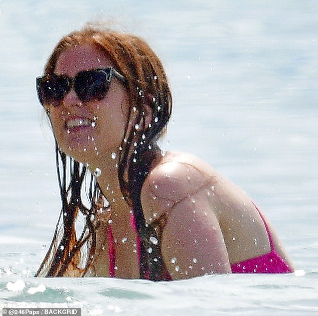 In her element: The Aussie star appeared to be in high spirits over the holidays