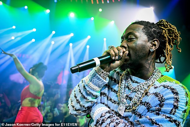 'We label as a team.  Let's shoot!  Offset and star-producer Cardi Tries closed out their set with their duet Clout from 2019