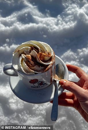 Another snowy shot showed her enjoying a delicious hot chocolate on the slopes.