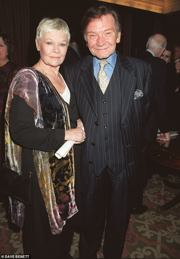 Actress Dame Judi, 89, has said she loves restorer Jay, 53, after he helped repair her late husband Michael Williams' watch (Dame Judi and Michael pictured in 2000)