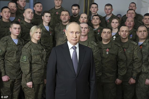 Russian President Vladimir Putin delivers his New Year address to the Russians during his visit to the Southern Military District headquarters in Rostov-on-Don, Russia, December 31, 2022.