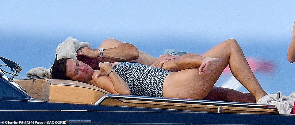 Canoodle: The couple, who have been married since 2009, enjoyed making out on the sun loungers on the luxury yacht.