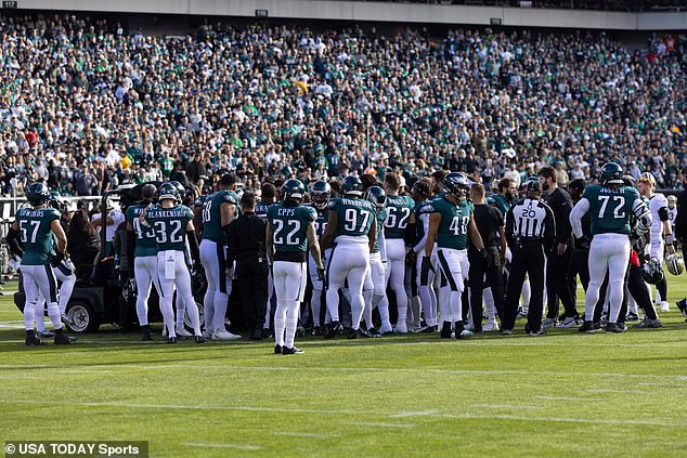 His concerned teammates watched as he was treated on the field before heading to the hospital.