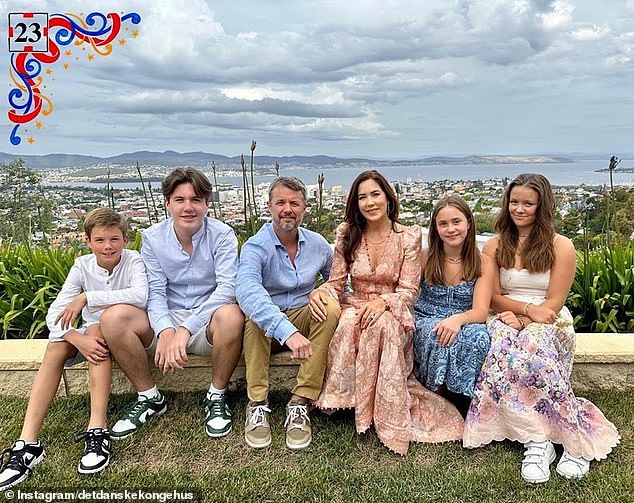 The princess shared an Instagram photo on Christmas Day where the family sat beaming in front of an incredible view of Hobart (pictured)