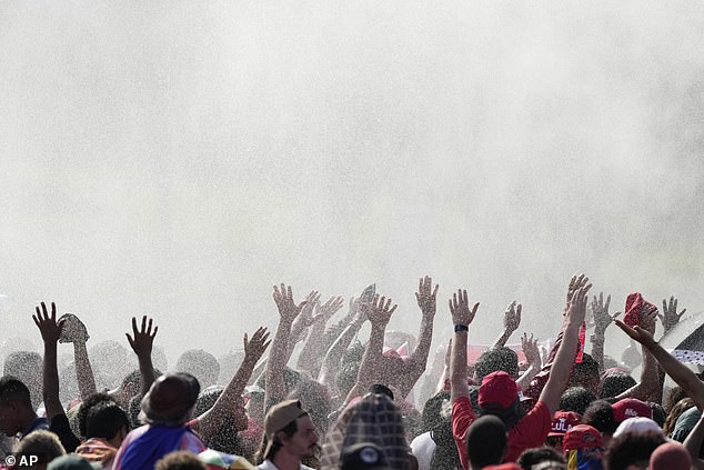 Firefighters sprayed water on those attending Lula's inauguration outside the Planalto presidential palace.