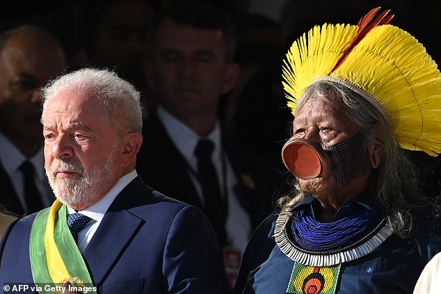 Lula was seen standing next to Metukire known as Chief Raoni.