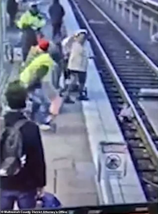 Fortunately, the spectators pushed her towards the platform.  She said that she had a bad headache and the local district attorney said that she had a red mark on her forehead.