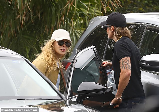 Keith opened the car door for Nicole when they got home from their day off.