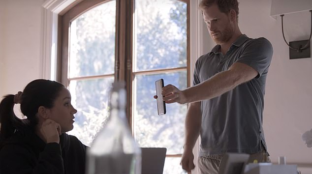 Harry shows Meghan a text message he received from William after his Oprah interview as shown in the Netflix series Harry & Meghan