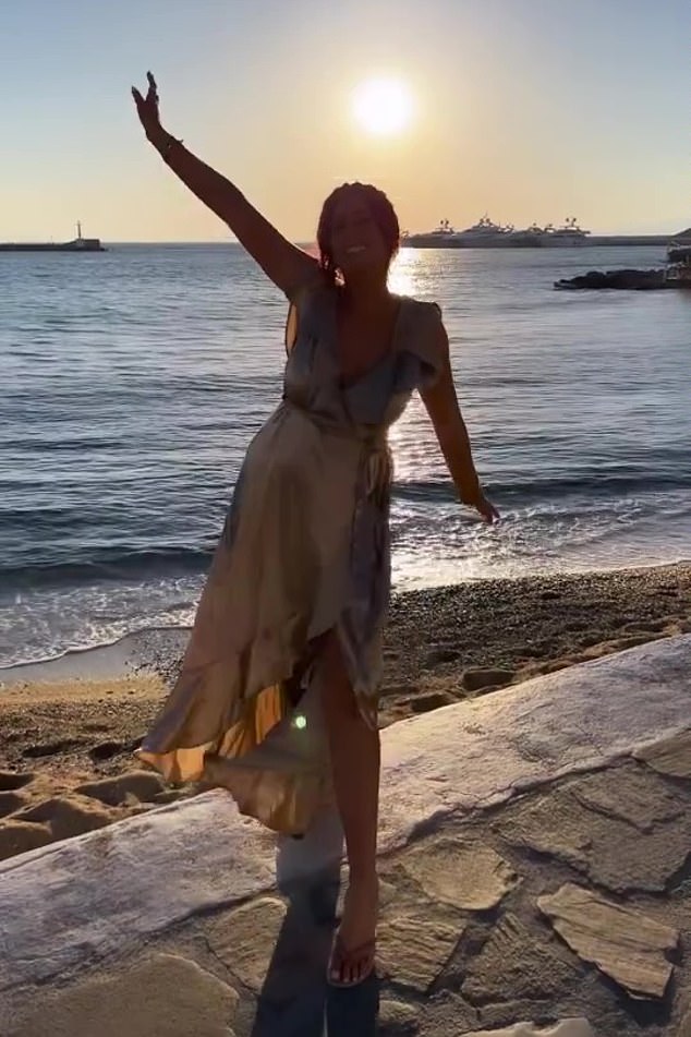 Looking good: She also posed for another photo on the beach enjoying a sunset before marrying Joe.