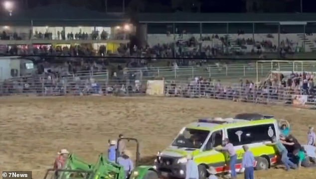 Heartbreaking photos of the tragedy show an ambulance in the middle of the arena being attended by locals.