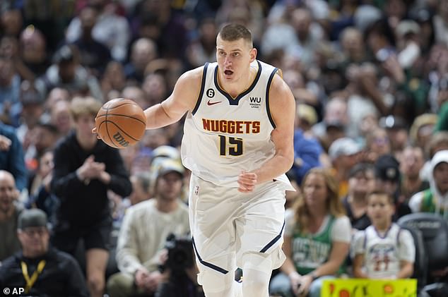 Jokic picks up a fumble in the second half against the Boston Celtics in Denver