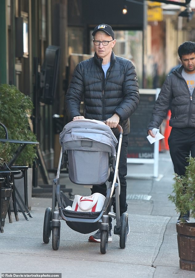 Bundle up: The 55-year-old broadcaster wore a big black jacket with a matching pair of pants and casual sneakers