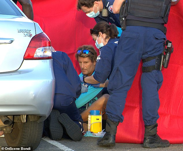 Bondi Rescue Star of the Bondi Rescue TV series, lifeguard Anthony 'Harries' Carroll (pictured) was seen crouching over the baby and helping paramedics.