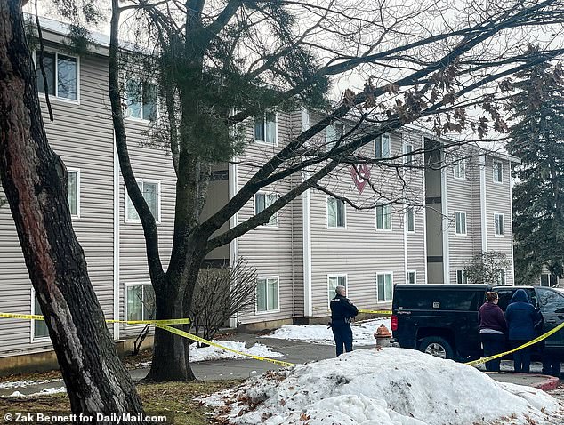 Forensic teams and police work at Kohberger's apartment near Washington State University in Pullman, Washington.