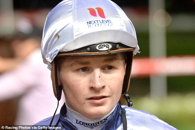 Both jockeys involved, Peter Knuckey and Jordan Turner (pictured), incredibly escaped any serious injury, with Turner, who was riding Dom To Shoot, seen in the assembly yard afterwards with a bloody nose.