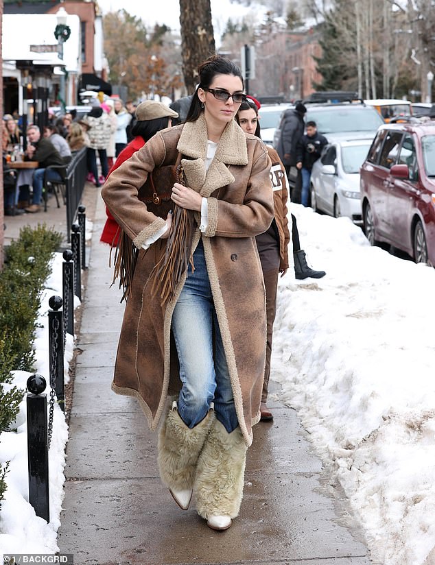 Here it is: Kendall, 27, looked as stylish as ever, bundled up in a long brown fleece-lined coat that she wore with furry-trimmed jeans and boots.