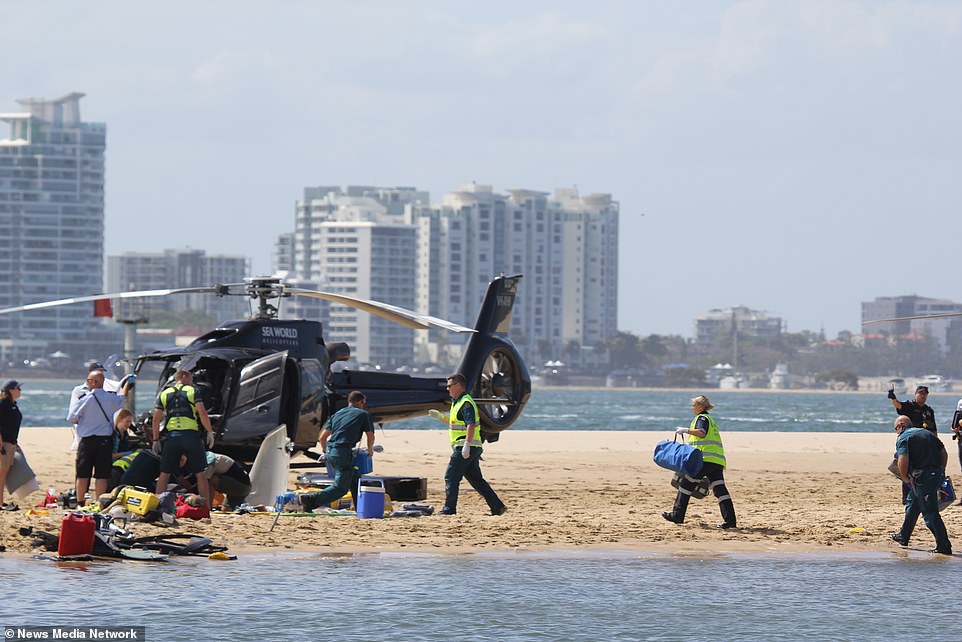 Photos showed that at least one of the two helicopters was a Sea World helicopter tour aircraft.