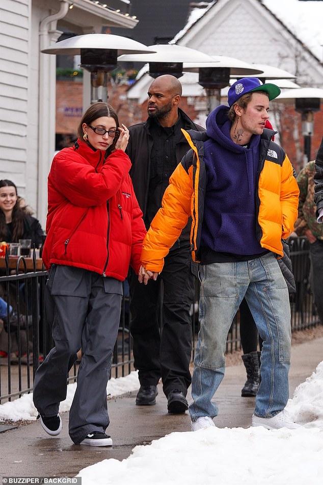 Beloveds: Making separate arrivals for The Kardashian stars, the couple held hands as they both dressed for the winter weather in puffer jackets