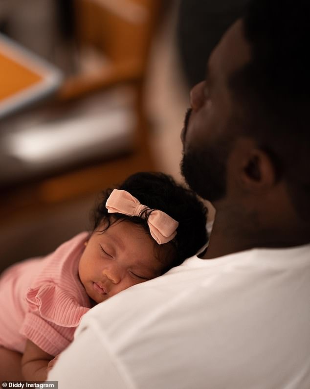 Dozing: One of the pictures showed Love snuggled up in a car seat, while the other was of the baby sleeping peacefully in her father's arms