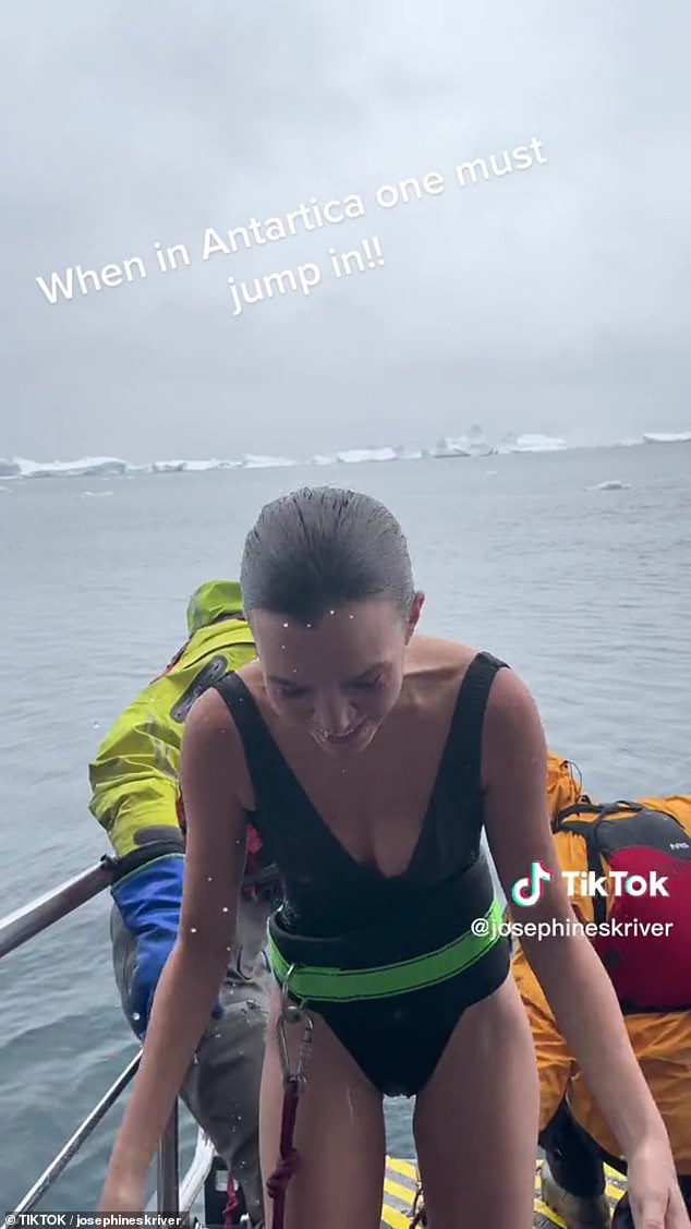 Fearless: The fashion magazine star didn't seem to fear any cold as she was filmed jumping into the water equipped with a seatbelt attached to the polar boat