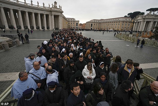 A long queue formed to enter the basilica to see Benedict, who was the first pope to retire in 600 years in 2013.