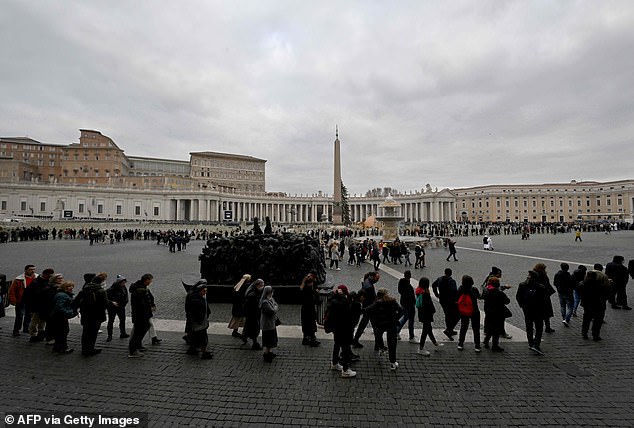 Huge queues formed outside the basilica as people came to pay their respects to the former pope.