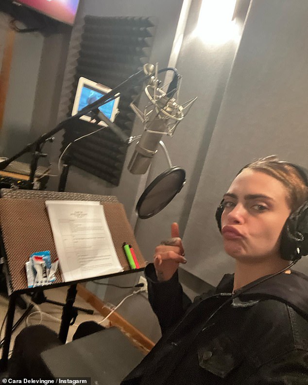 Hard at work: She also shared a snapshot of herself doing voiceover work in a studio